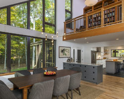 Dining area with built-in buffet and library above