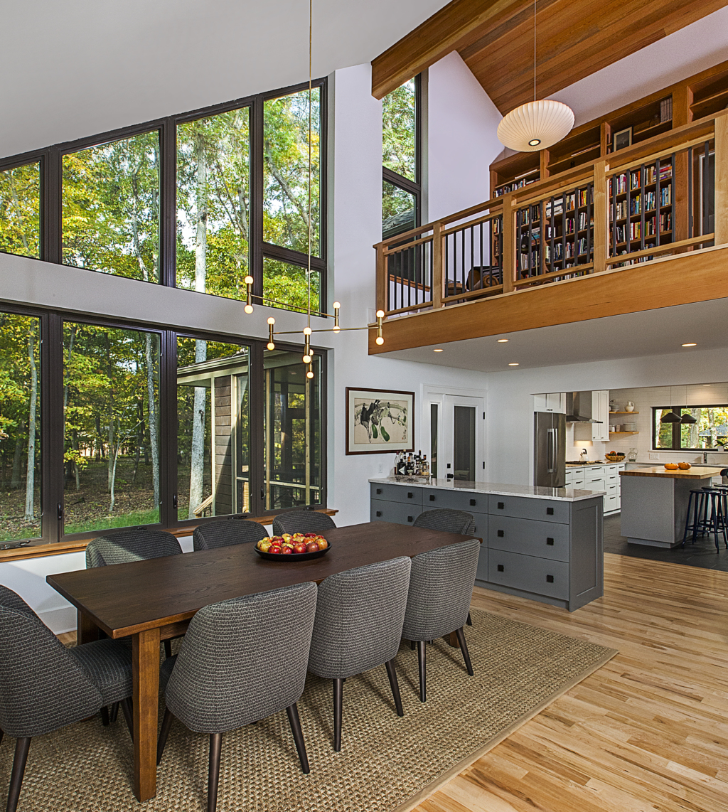 Dining area with built-in buffet and library above