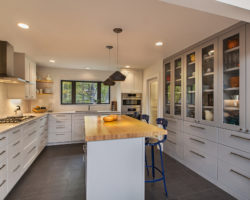 Kitchen with butcher-block island and pantry